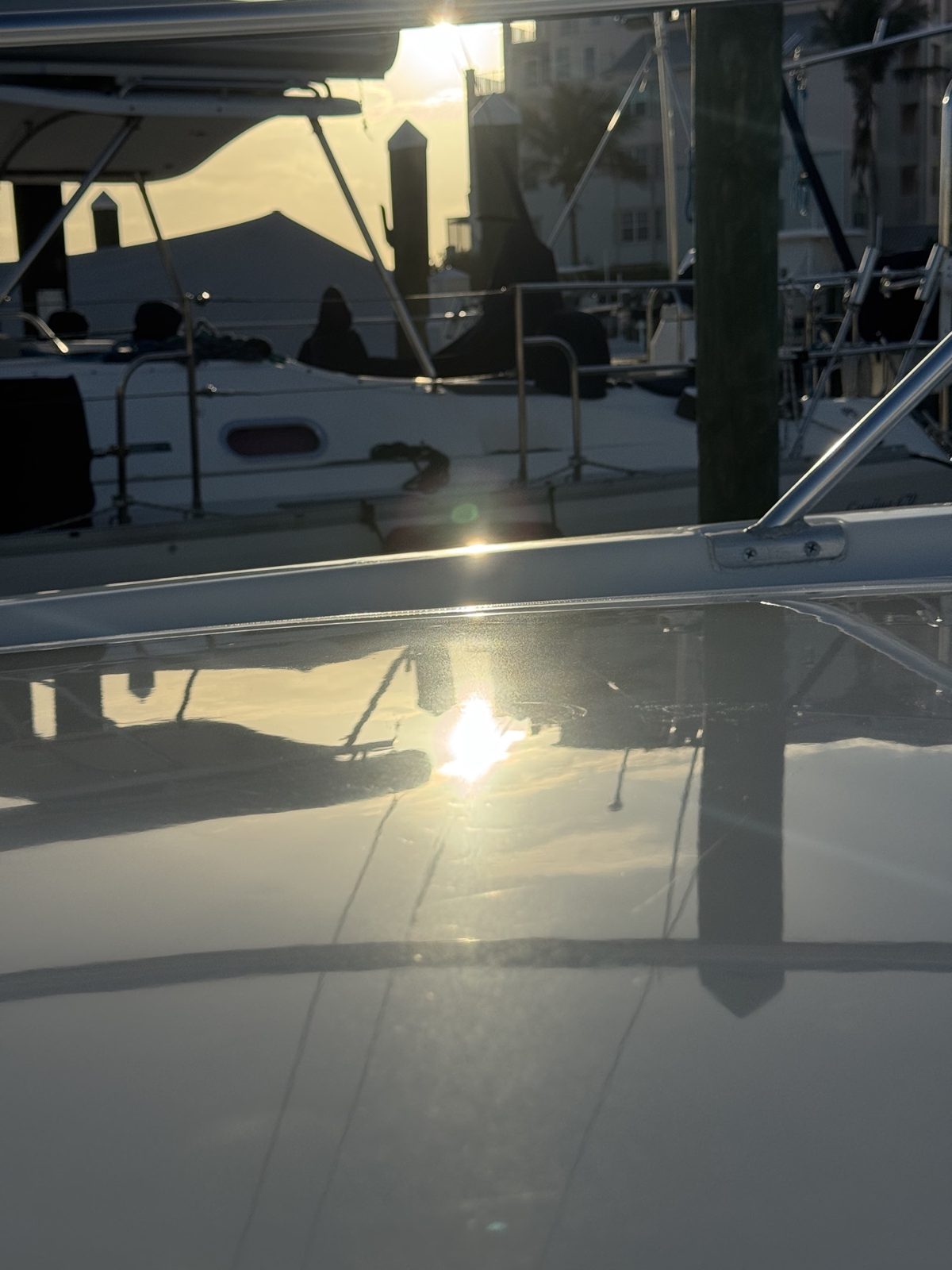Corrected gelcoat reading like glass under direct light